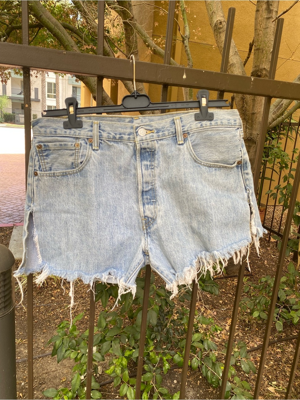 Vintage Levi’s Light Wash Distressed Denim Shorts - Women